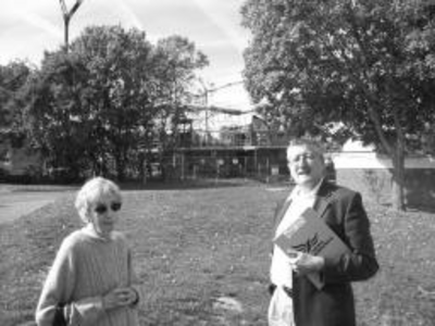 Councillors Sheila Rowland and Brian Gurden near the fire