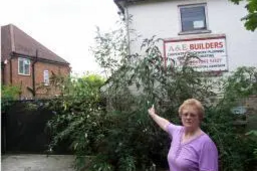 Cllr Doris Jones in front of the A&E Builders Yard