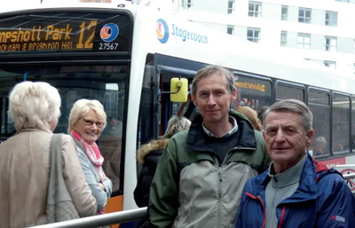 Ron and John at the bus station