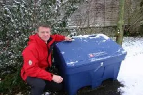 Cllr Hussey at one of the new salt bins