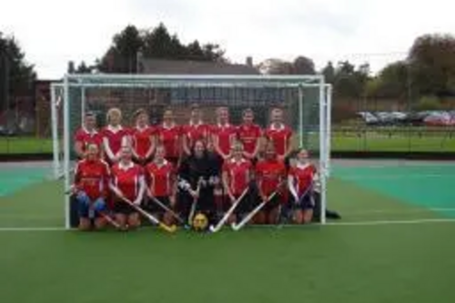 Basingstoke Ladies Hockey First Team posing at Down Grange