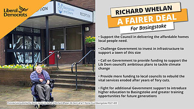 Richard Whelan outside Basingstoke and Deane Council, next to a list of local libdem policies