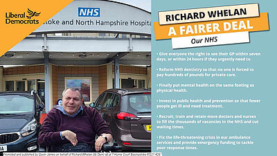 Richard Whelan at Basingstoke hospital next to libdem policies for the NHS