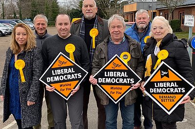 Tadley area libdem councillors and supporters with signs